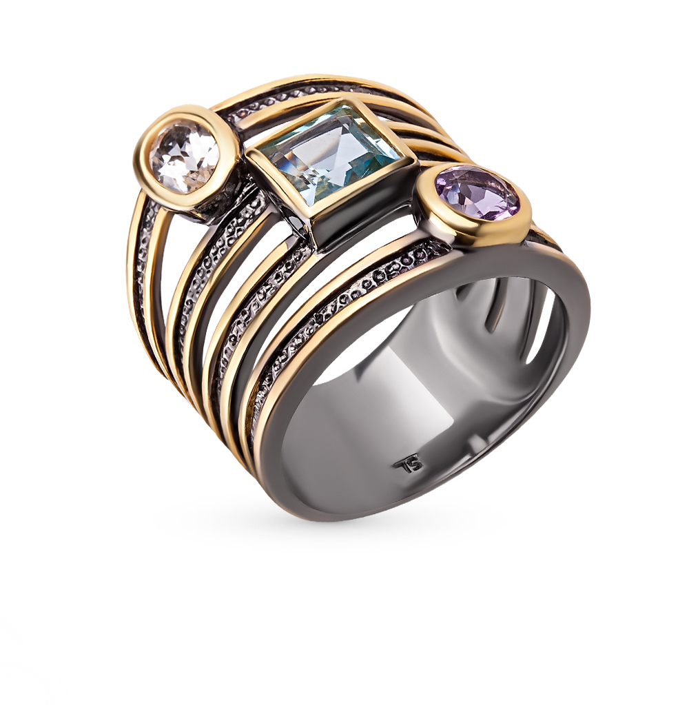 Фото «Серебряное кольцо с топазами и аметистом»